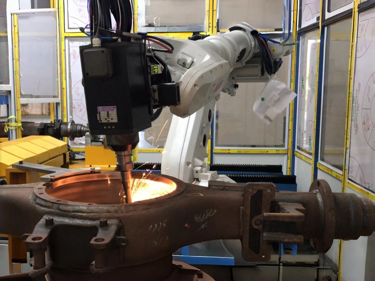 Robotic deburring removes burrs from metal part edges