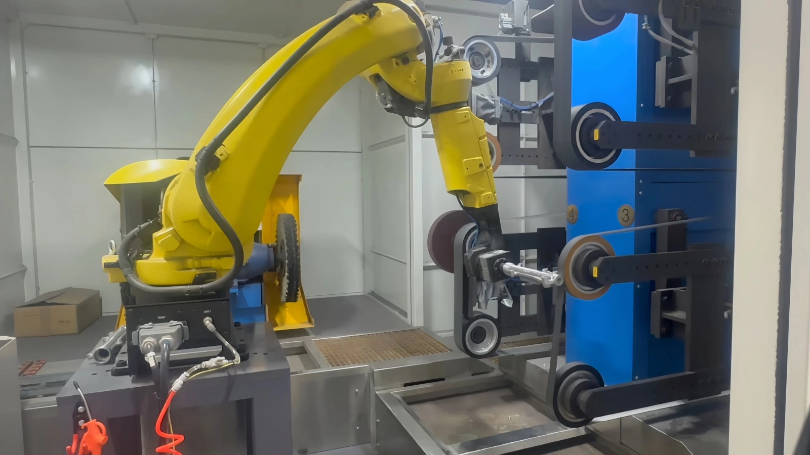 Robotic surface finishing of a metal workpiece