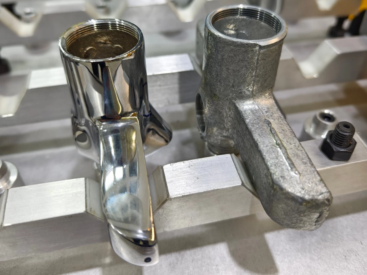Unprocessed metal parts and a reference sample showing the required finish