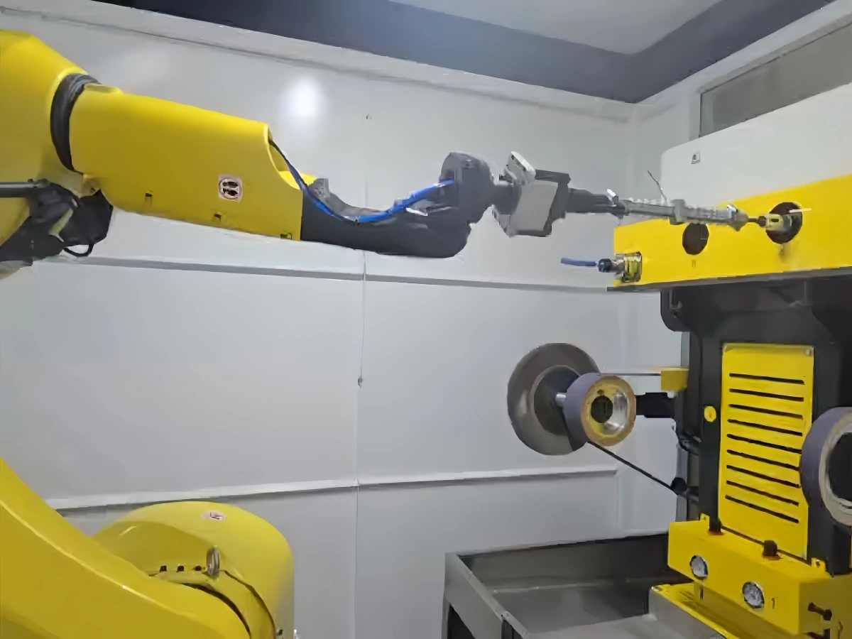 Workholding arrangement for robotic deburring of an aluminum casting