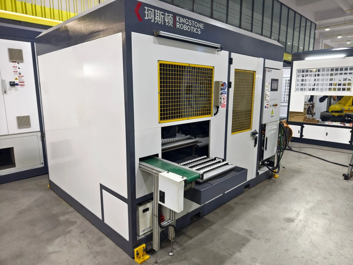 automated robotic grinding cell with dust control