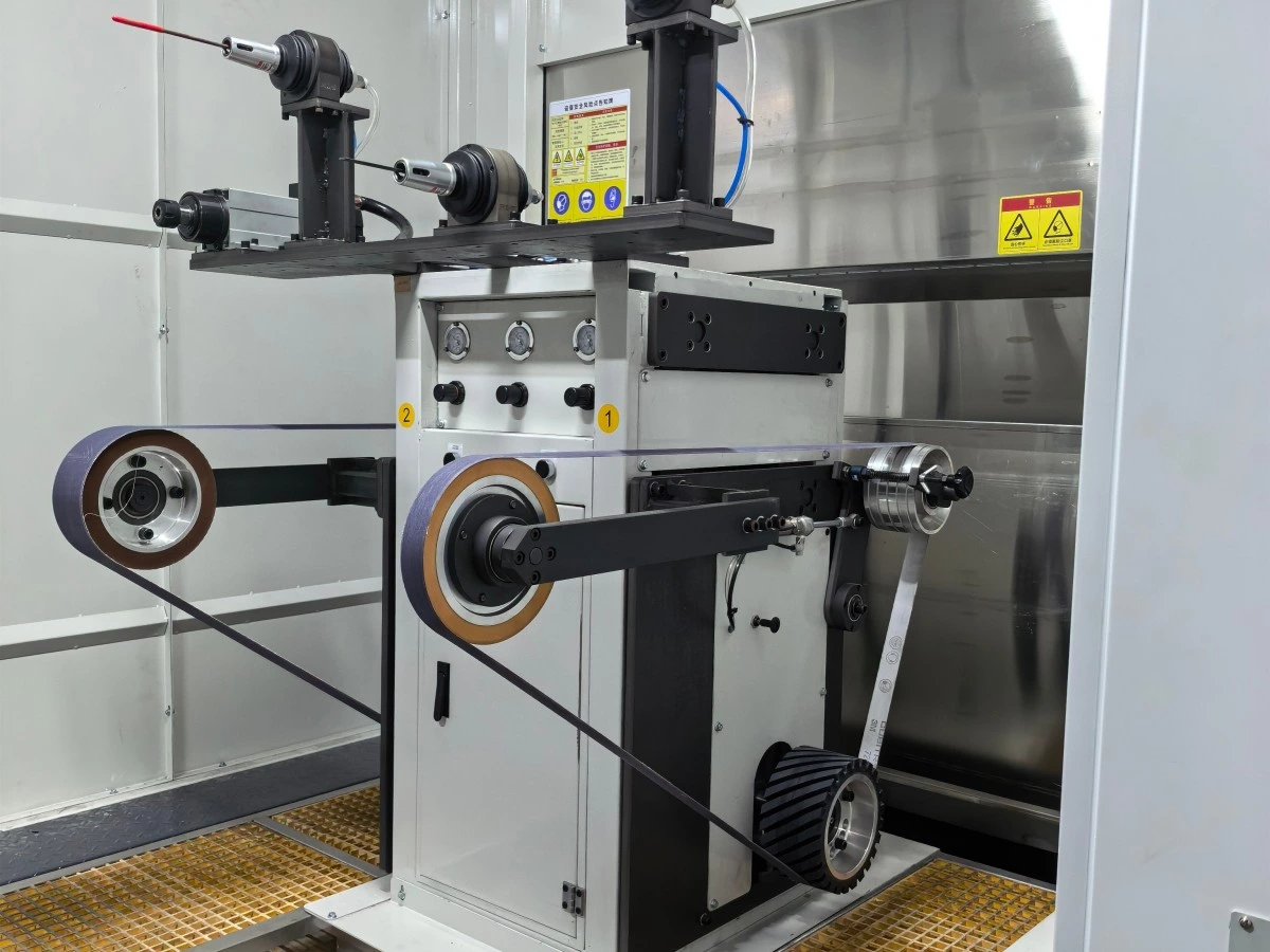 Abrasive belt and polishing wheel stations in a robotic finishing cell